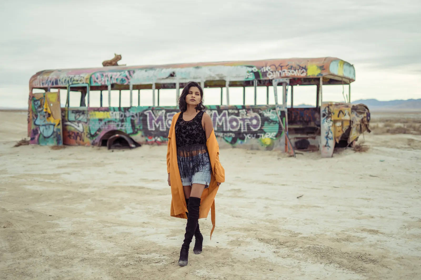 Navz-47 standing in front of a painted bus